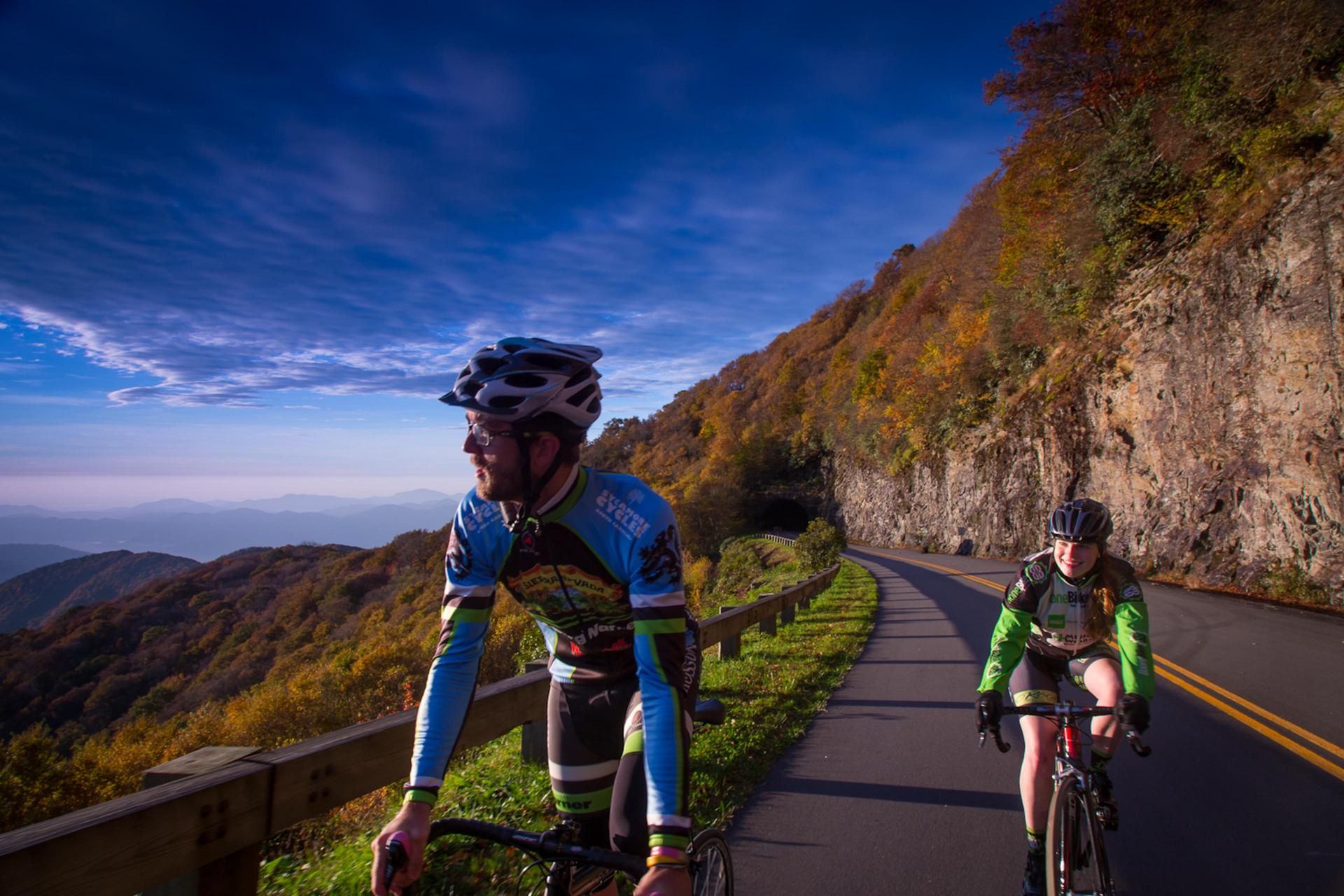 Two cyclists ride the Blue Ridge Parkway in Asheville